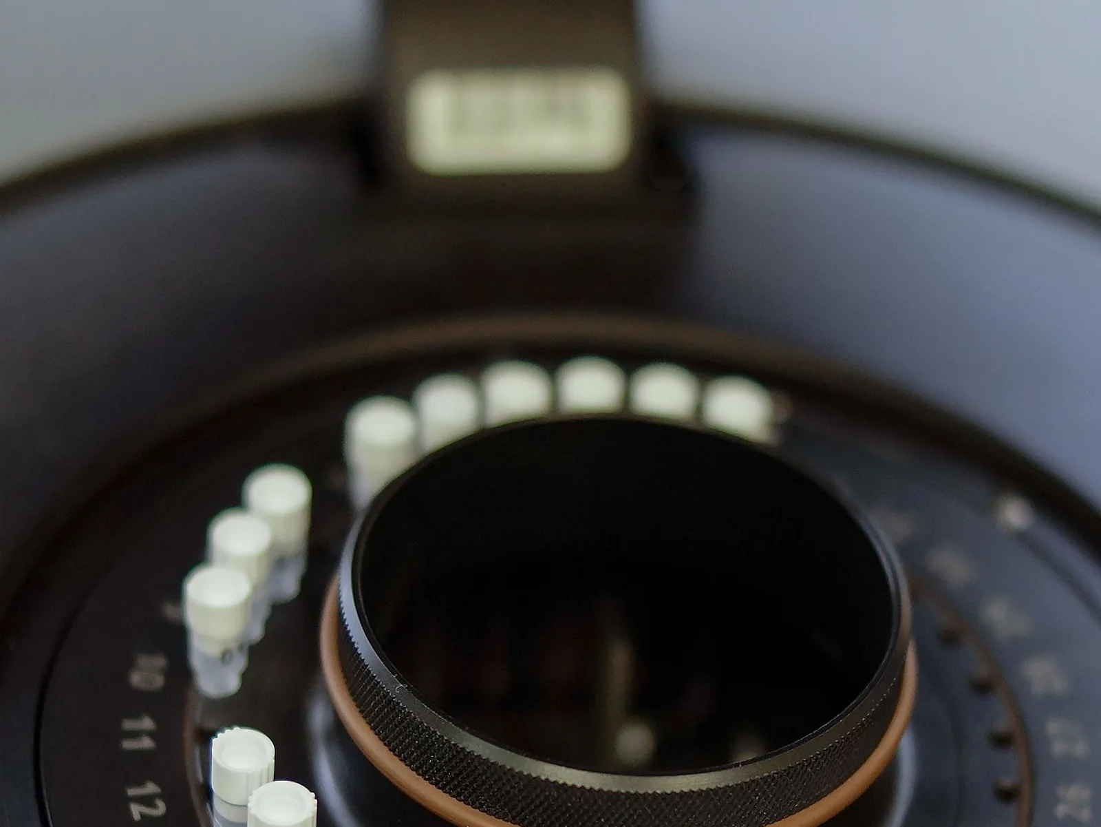 Close-up detail of laboratory sample analysis equipment